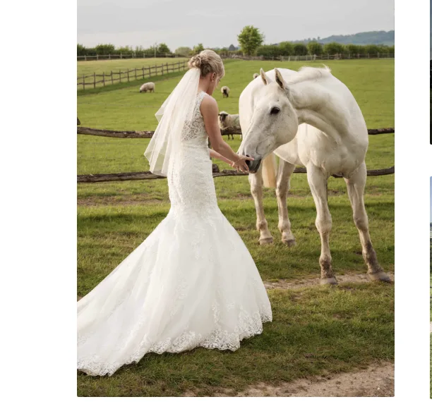 A bride with a white horse at Greenhill Farm, Otham